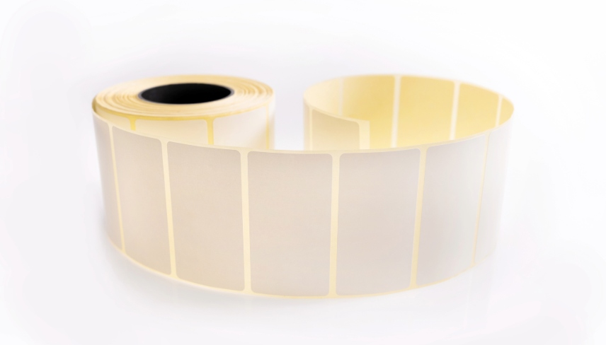 Barcode sticker roll for product price and promo isolated on white background