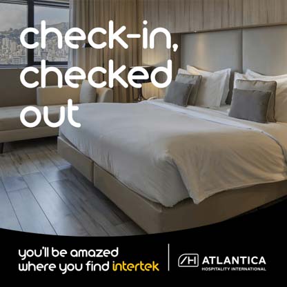 A large bed in a hotel room